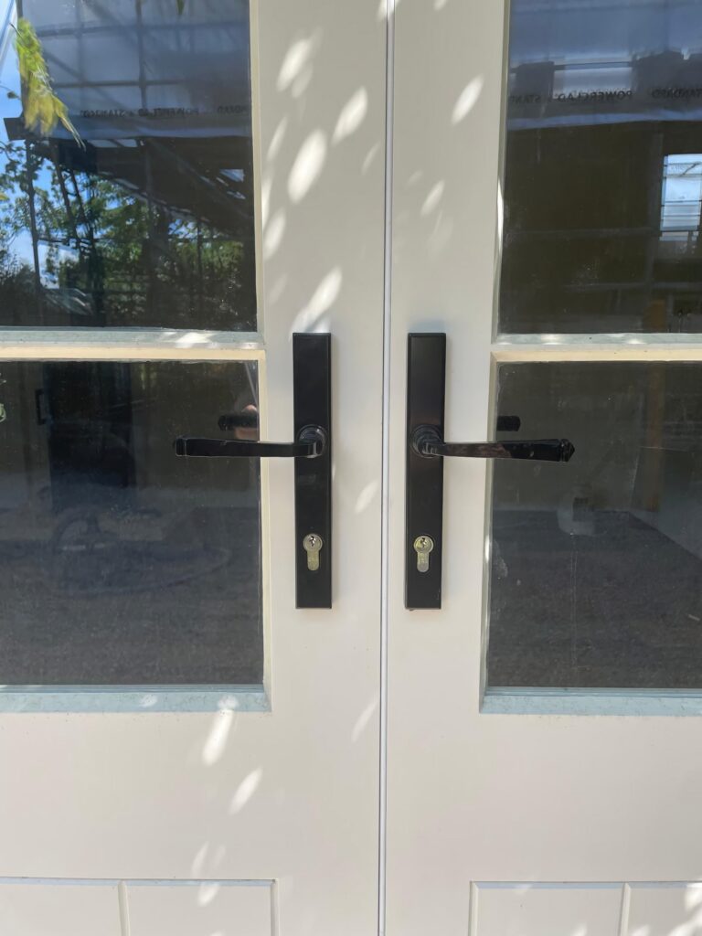 Accoya Timber External Door Set With Slimline Glazing And Insulated Panels Painted White Handle Detail.jp Exterior Doors Trinity Joinery Jersey 2500