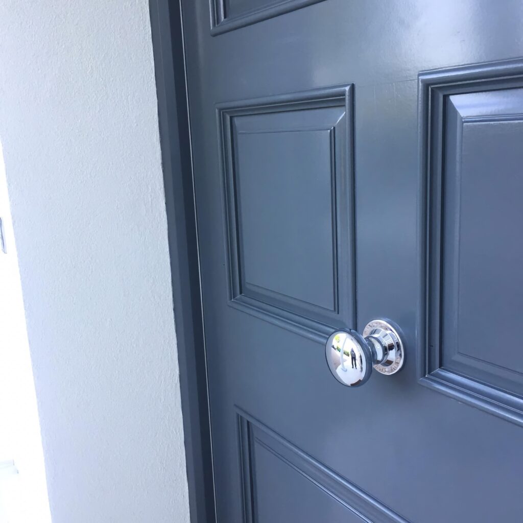 Bespoke Dark Grey Front Door Close Up With Chrome Round Handle Jersey Exterior Doors Trinity Joinery Jersey 2500