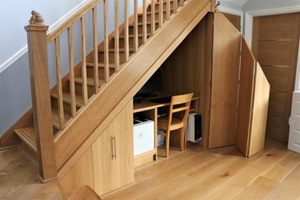 Bespoke Oak Under Stairs Home Office And Storage With Fitted Desk And Cupboards Staircases Balustrade Trinity Joinery Jersey 2500