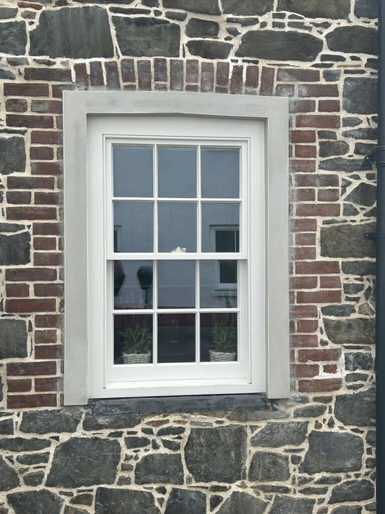 Casement Window White Timber Frame With Brick And Stone Surround Windows Trinity Joinery Jersey 2500