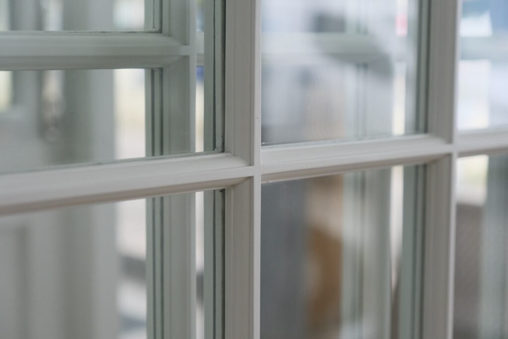 Close Up Of White Timber Window Glazing Bars.jpg Trinity Joinery Jersey 2500