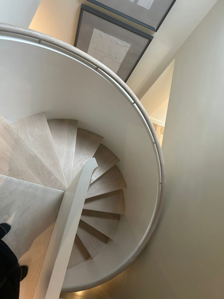 Curved Staircase Light Ash Grey With Continuous Handrail Staircases Balustrade Trinity Joinery Jersey 2500