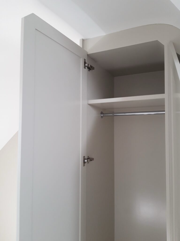 Custom Under Stairs Wardrobe Interior With Hanging Rail And Shelf Jersey Cabinets Trinity Joinery Jersey 2500