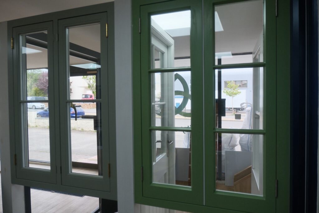 Dual Colour Timber Casement Windows In Green Grey Finish.jpg Trinity Joinery Jersey 2500