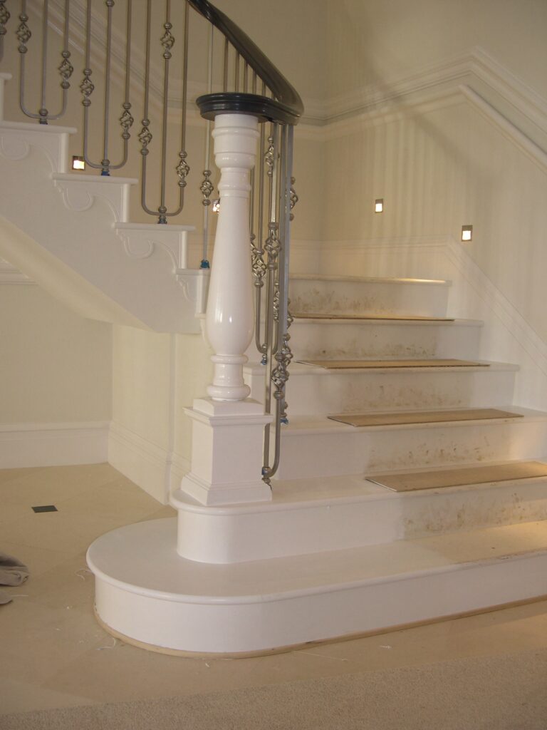 Elegant White Staircase With Iron Balustrade Jersey Joinery Staircases Balustrade Trinity Joinery Jersey 2500