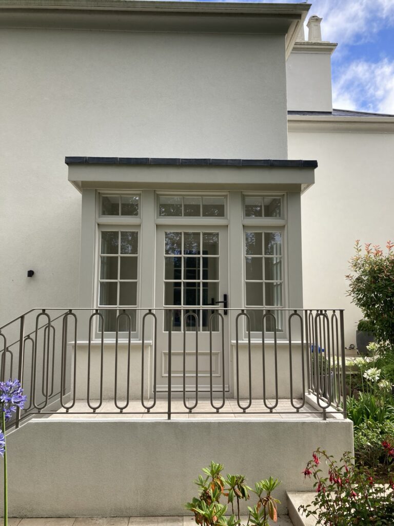 French Door With Sidelights Painted White Timber Frame Glazing Bars With Balcony Railings.jpg Exterior Doors Trinity Joinery Jersey 2500