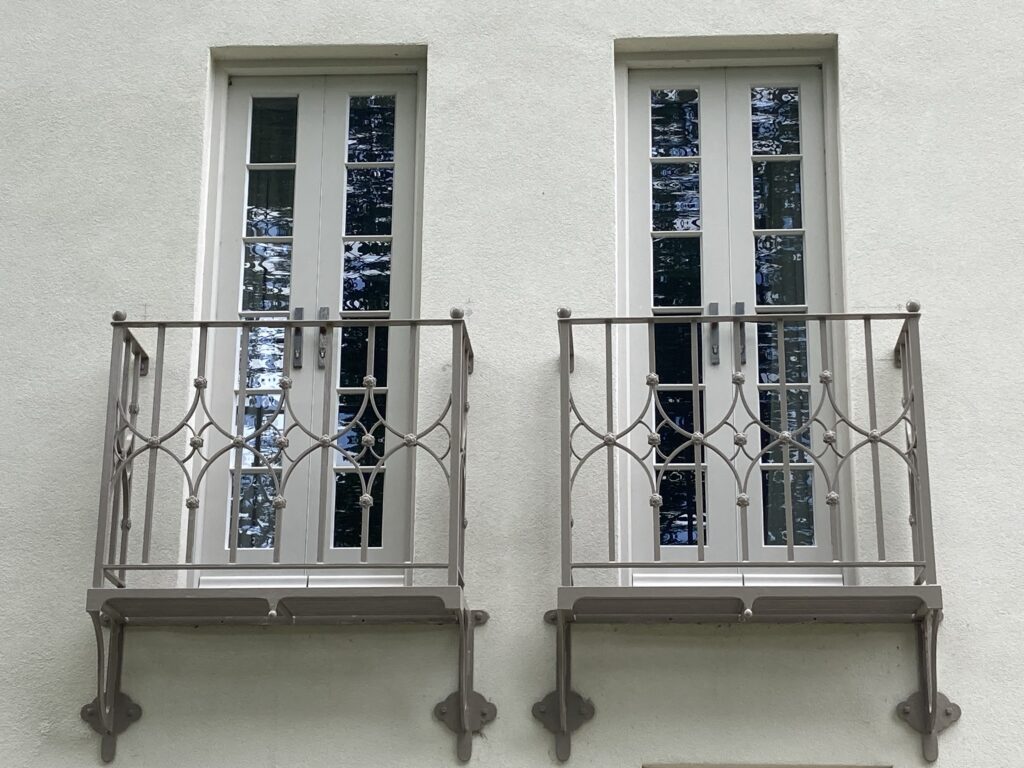 French Doors With Decorative Wrought Iron Juliet Balconies Painted White Finish.jpg Exterior Doors Trinity Joinery Jersey 2500