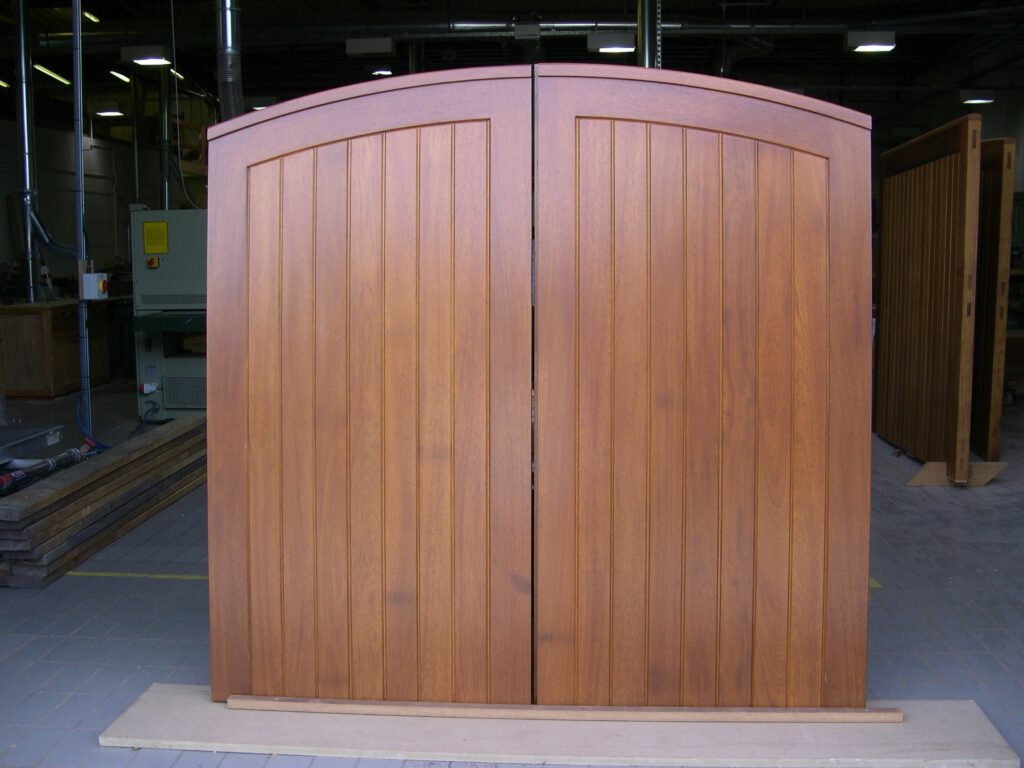 Iroko Wood Driveway Gate Arched Top Vertical Panels Gates Trinity Joinery Jersey 2500