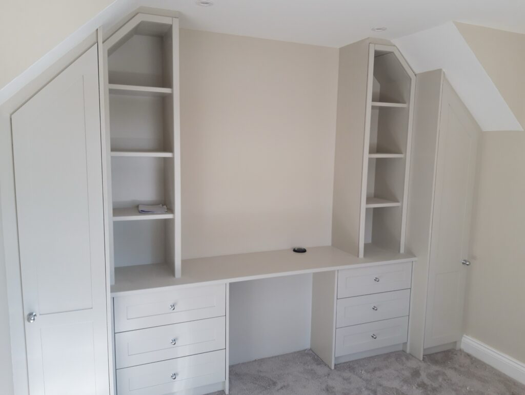 Painted Fitted Desk With Drawers And Shelving Between Wardrobes Cabinets Trinity Joinery Jersey 2500