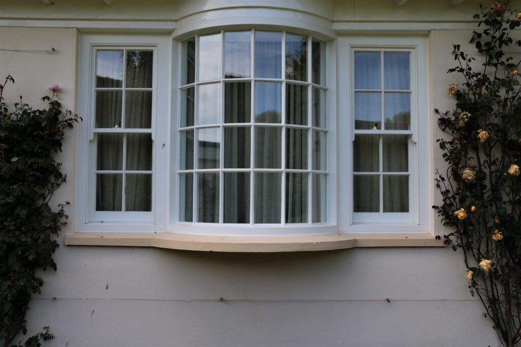 Timber Curved Bay Window Installation With Georgian Bars Painted White Close Up Windows Trinity Joinery Jersey 2500
