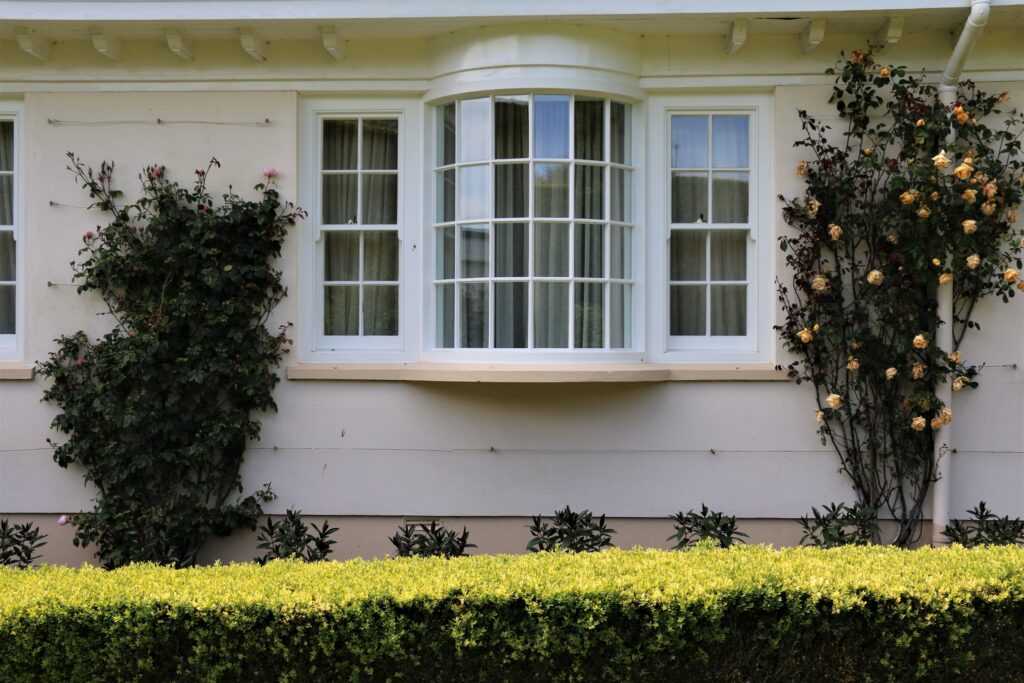 Timber Curved Bay Window Installation With Georgian Bars Painted White Garden View Windows Trinity Joinery Jersey 2500