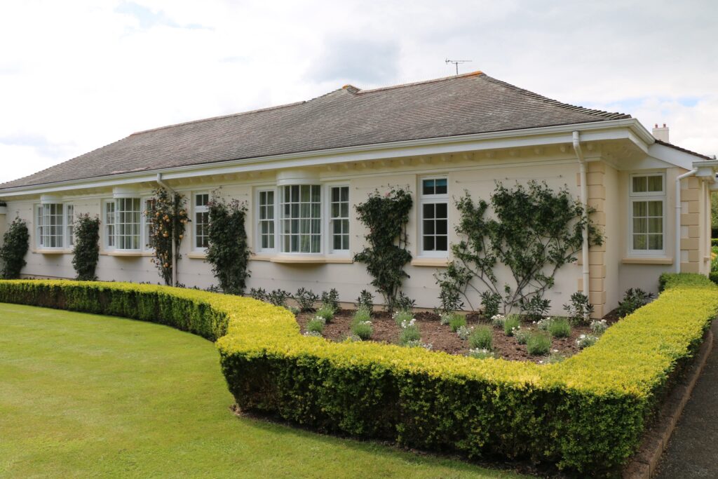 Timber Curved Bay Window With Georgian Bars Painted White Exterior View Windows Trinity Joinery Jersey 2500