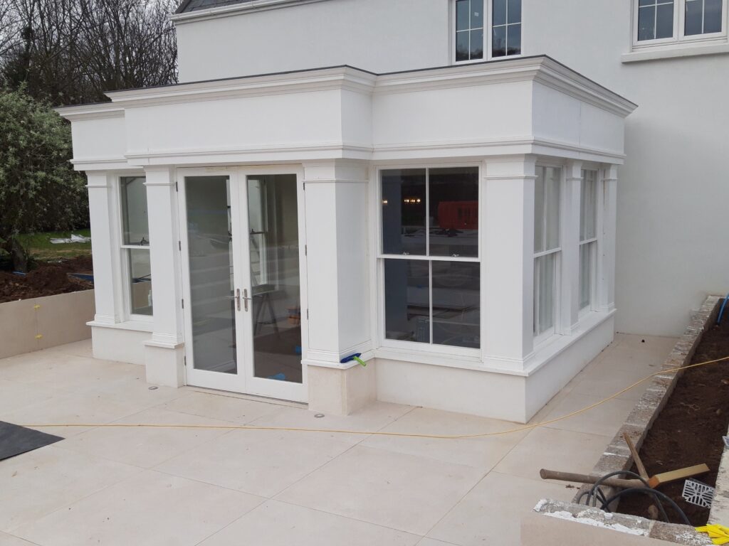 Timber French Doors With Double Glazed Panels And Sash Windows Painted White Garden View Trinity Joinery Jersey 2500