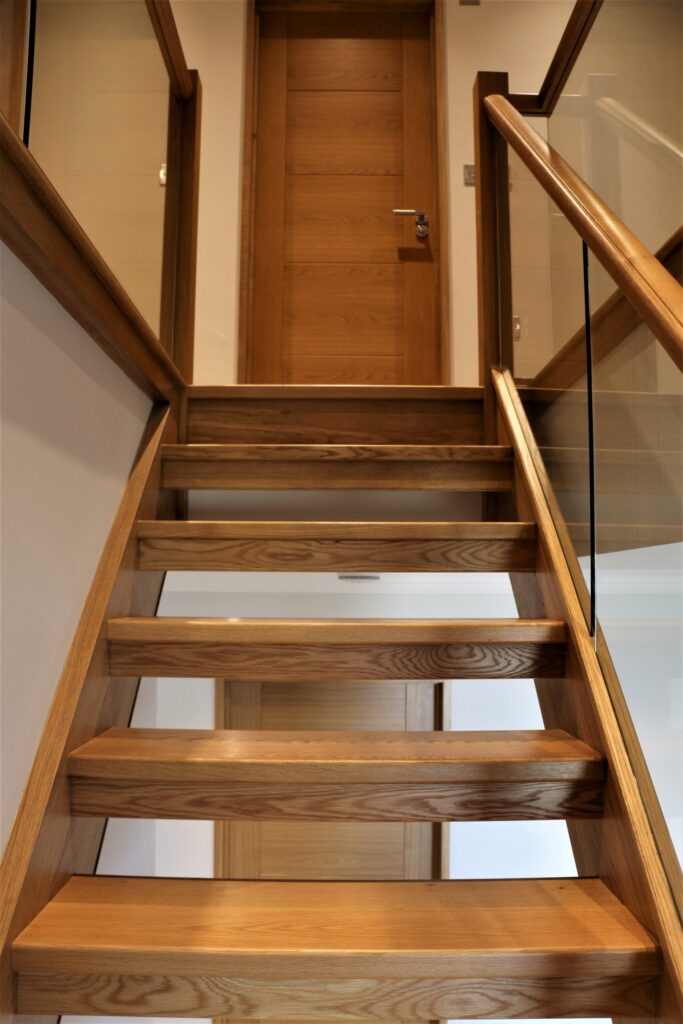 Timber Oak Staircase With Glass Balustrade Upward View Staircases Balustrade Trinity Joinery Jersey 2500