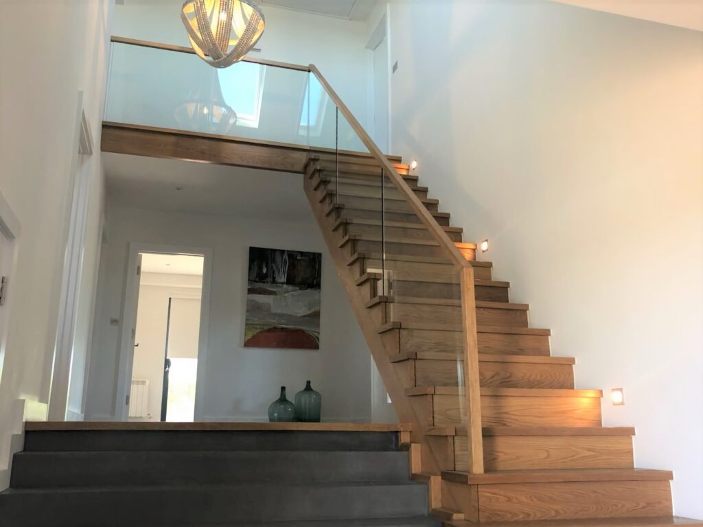 timber staircase with glass balustrade and oak handrail modern interior view house project staircases balustrade trinity joinery jersey 2500