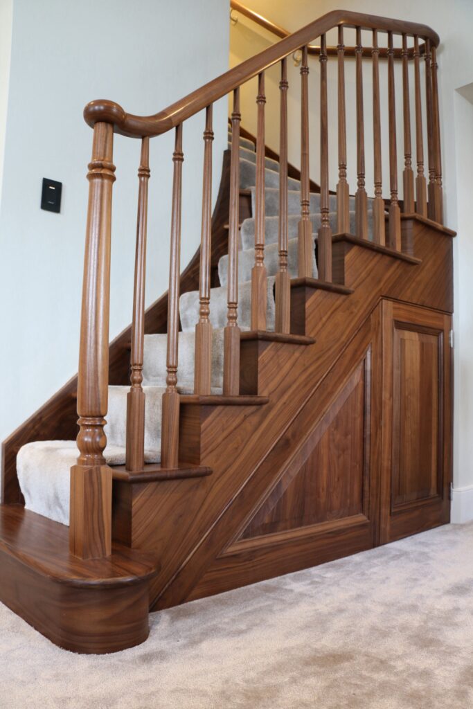 Timber Staircase With Turned Spindles And Carpet Runner Side Angle View Staircases Balustrade Trinity Joinery Jersey 2500