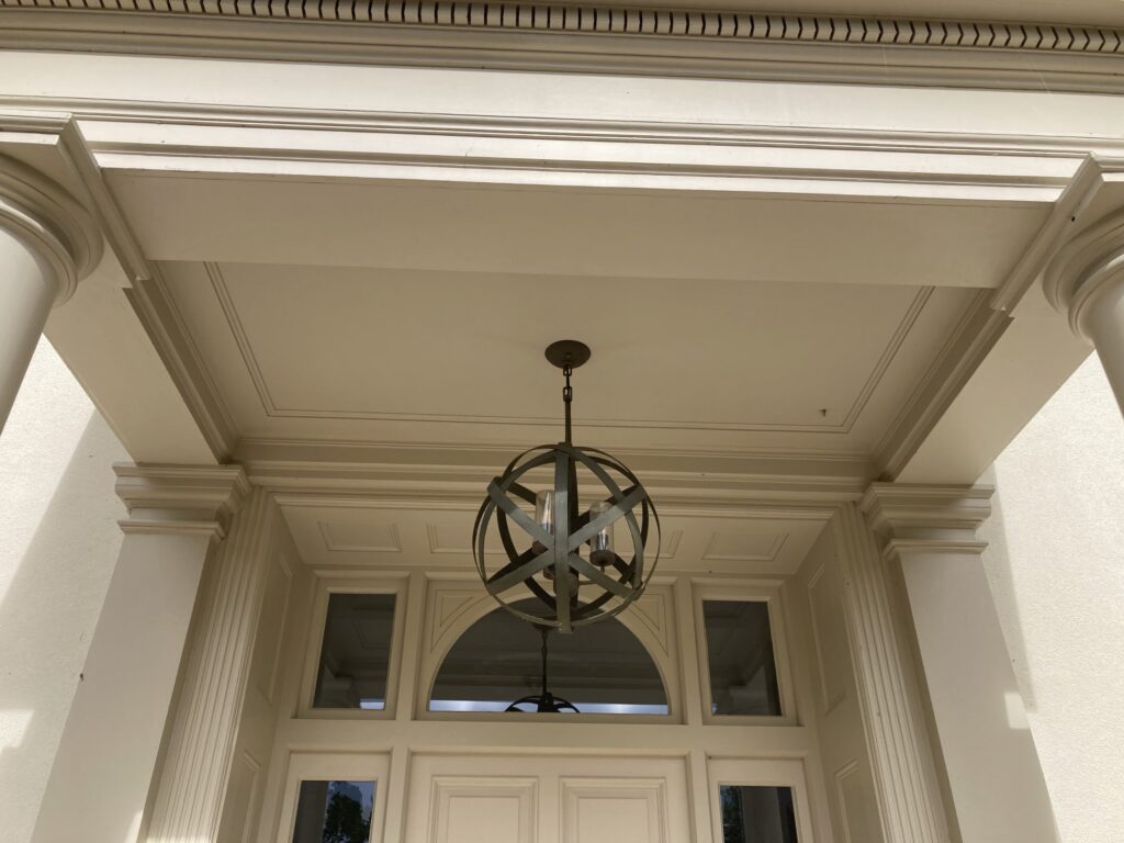 traditional entrance white timber door with decorative panelling overhead lantern light.jpg exterior doors trinity joinery jersey 2500