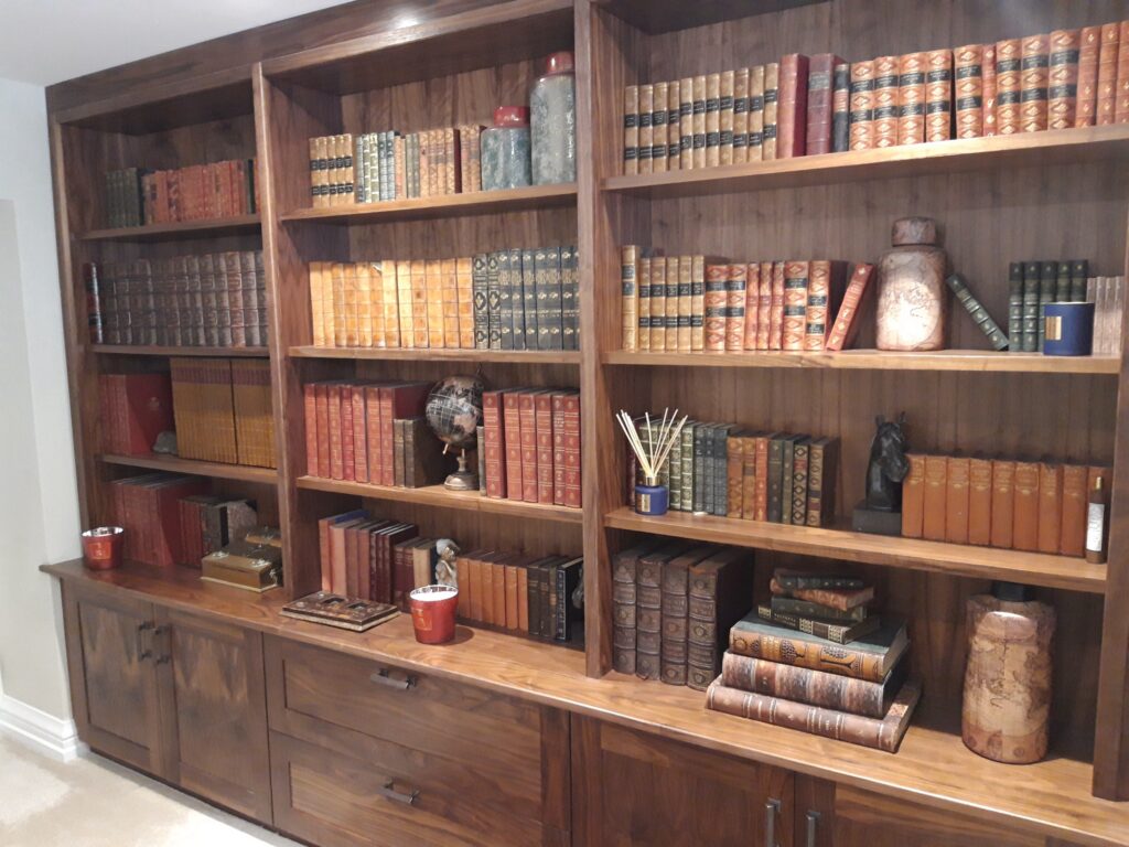 Walnut Bookshelves With Decorative Books And Cabinets Trinity Joinery Jersey 2500